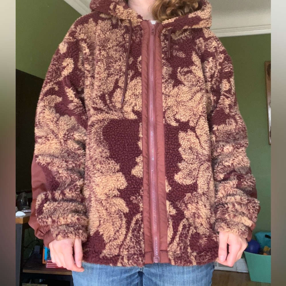 L Urban Outfitters cozy zip-up fleece with elbow detail and hood.